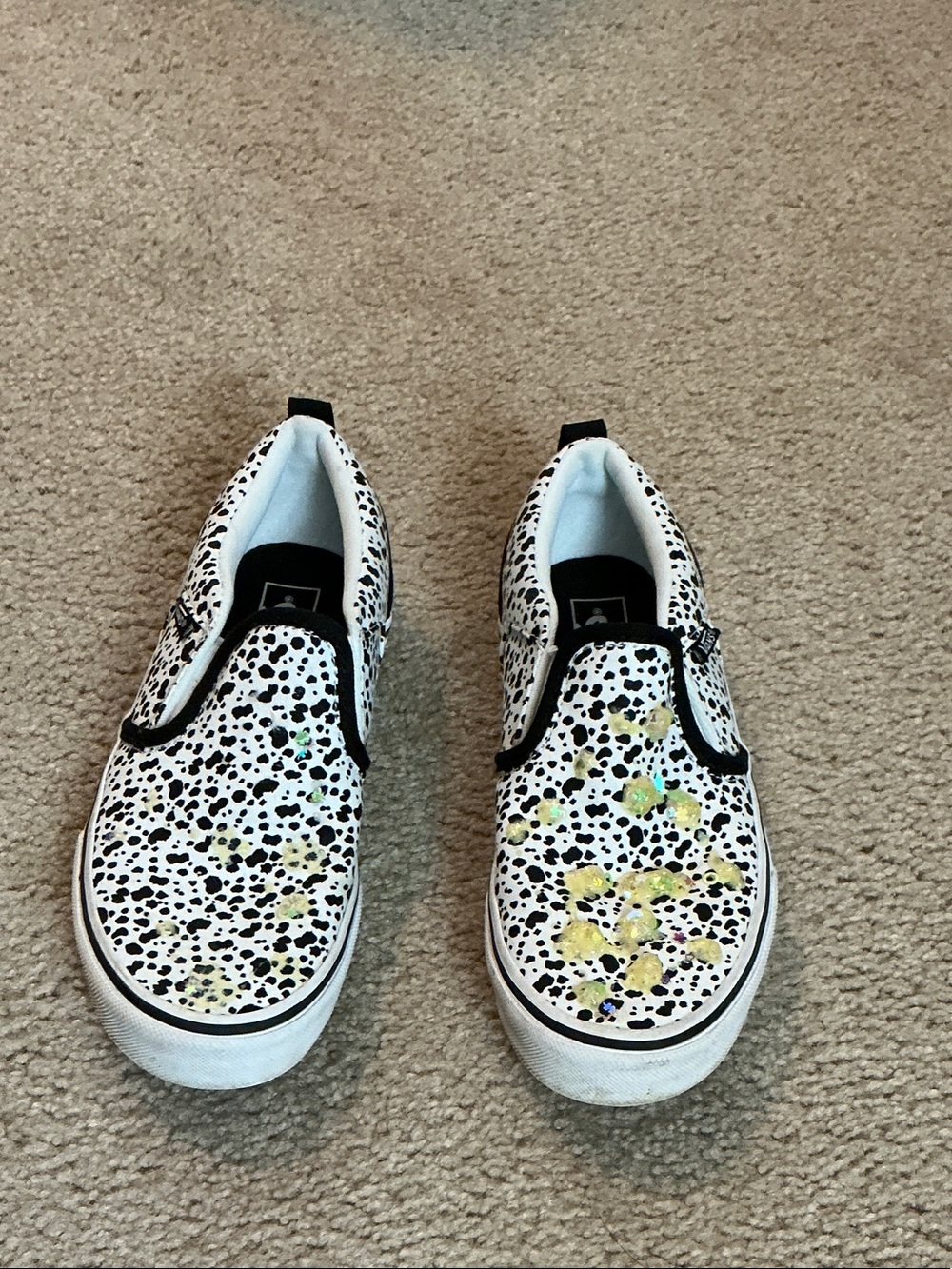 Vans Kids Slip-On Sneakers in White & Black Dalmatian Print with Yellow Accents